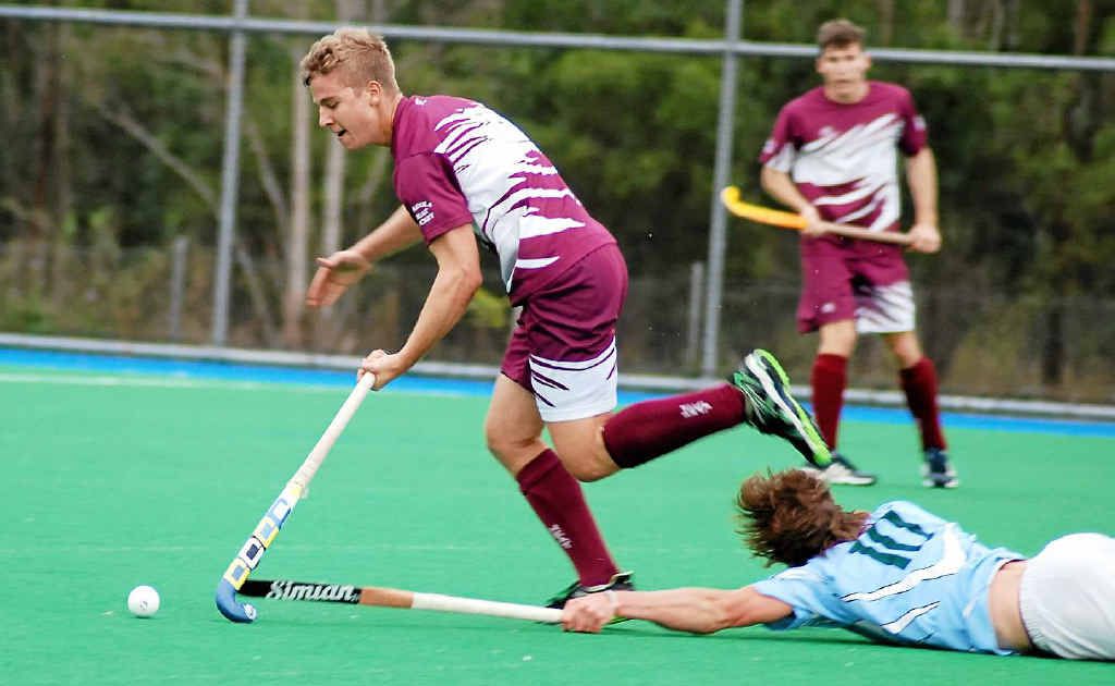 Codey Warhurst runs the ball past a diving Brothers defender on Saturday. Codey Warhurst runs the ball past a diving Brothers defender on Saturday.
